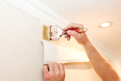 Pose de papier peint au Riols — revêtements muraux et toiles de verre